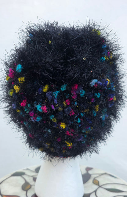 Confetti Queen crown hat on mannequin, white background