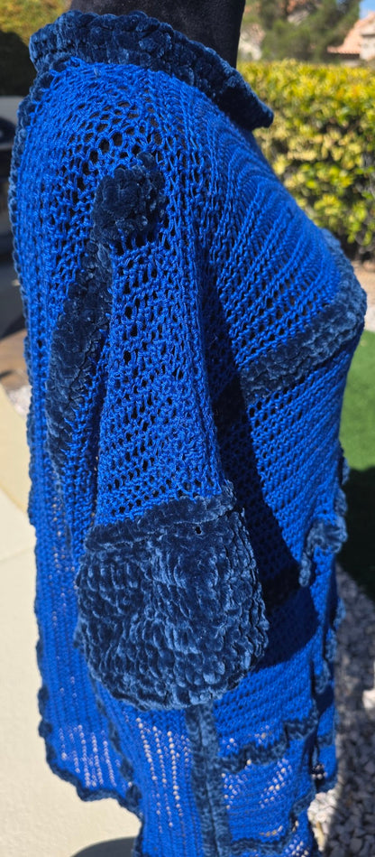 Cobalt Water tunic dress on mannequin, side view — velour cuff detail