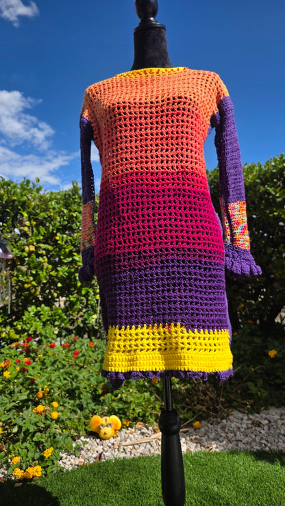 Spectrum Sunset crochet dress on mannequin — front view