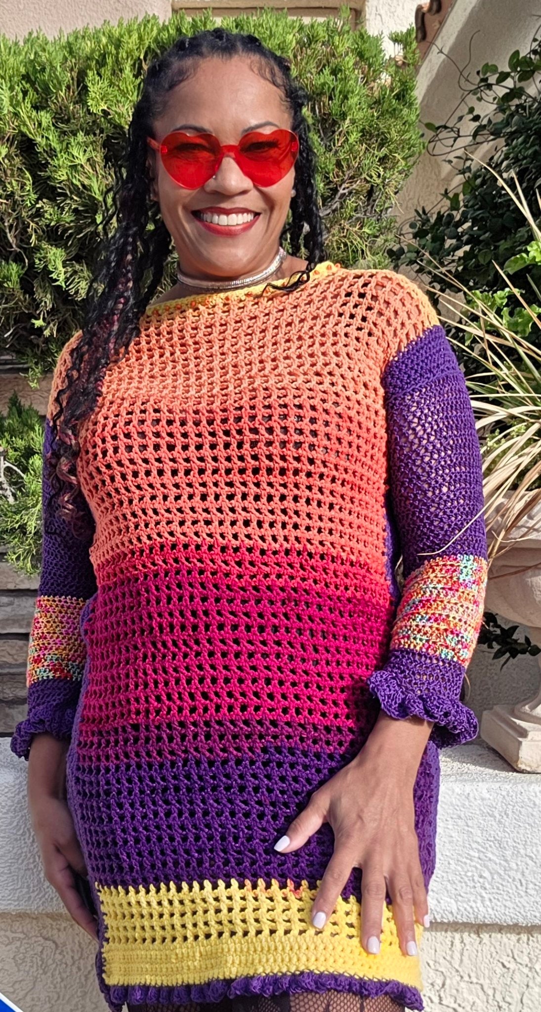 Spectrum Sunset handmade crochet dress worn by Empress Vida — front view, full rainbow spectrum bands
