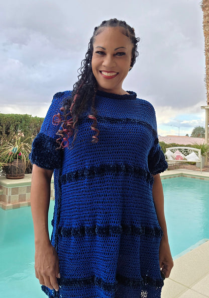 Cobalt Water tunic dress worn by Empress Vida — front view, poolside
