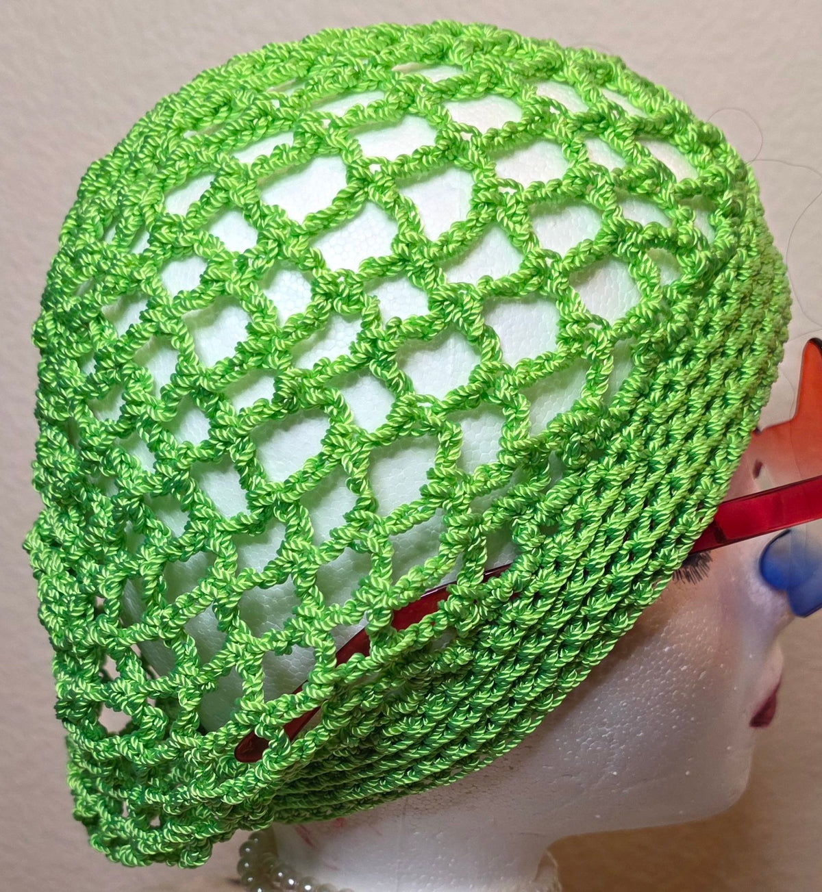 Verde Bloom Hat openwork detail — close-up of lime-green lattice crochet stitch