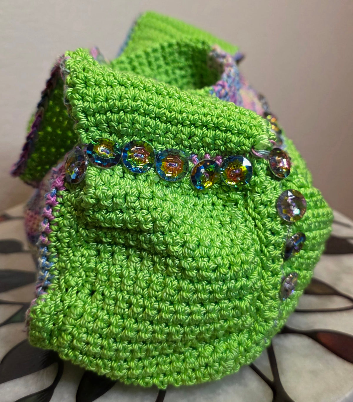 Verde Purse — end view with iridescent glass button row
