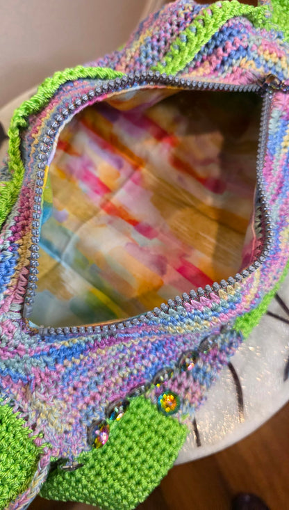 Verde Purse interior — zipper open, cotton pastel watercolor print lining