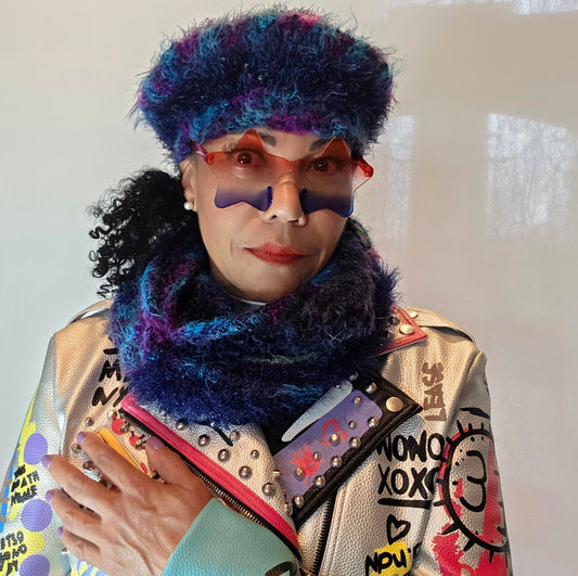 Empress Vida wearing the Blue Star crochet hat and infinity scarf set